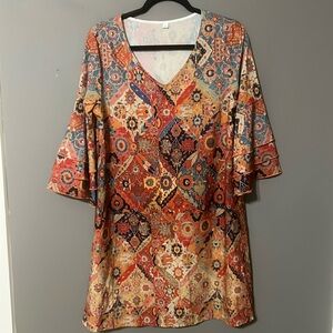 Beautiful and bold bell sleeved dress